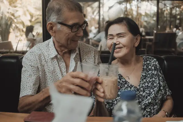 Sample stock photo: couple laughing at a cafe